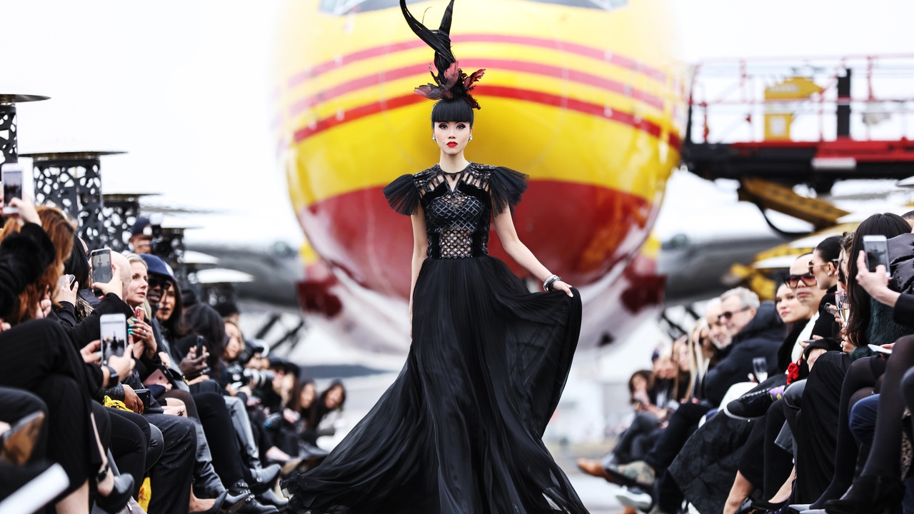 High-fashion model walking the runway at New York Fashion Week designer runway show